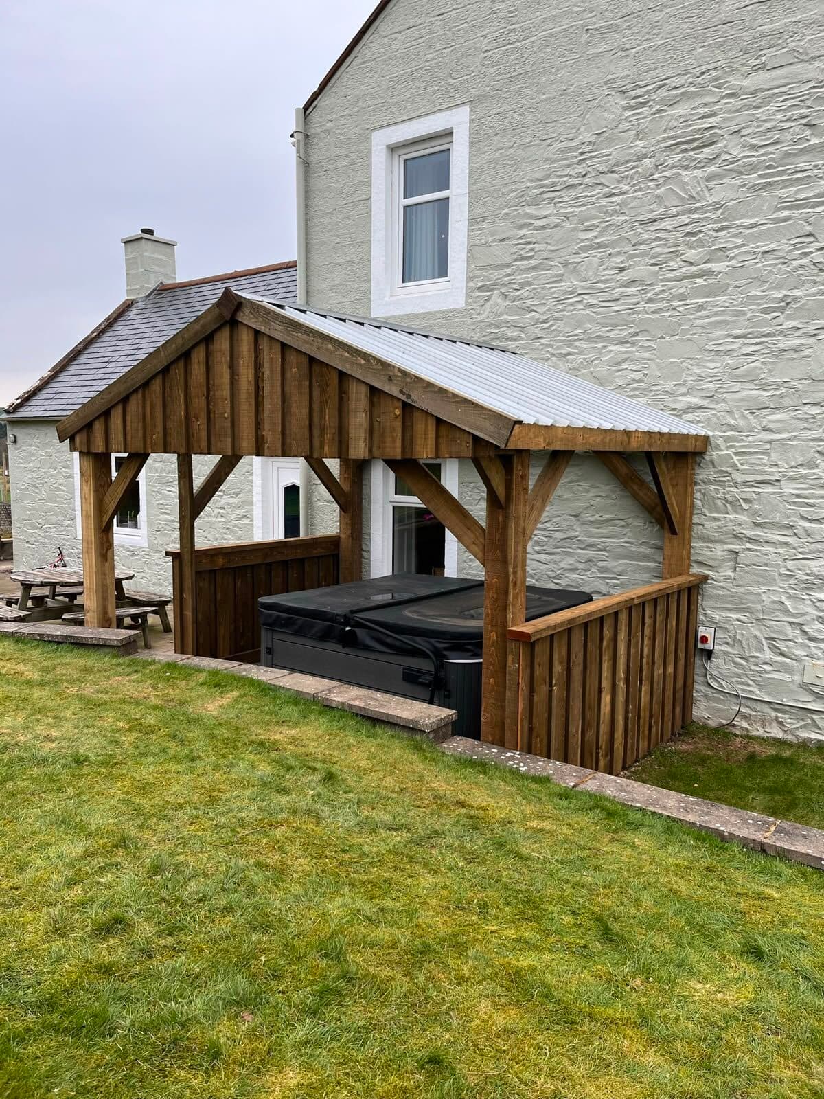 Timber pergola built over a garden walkway