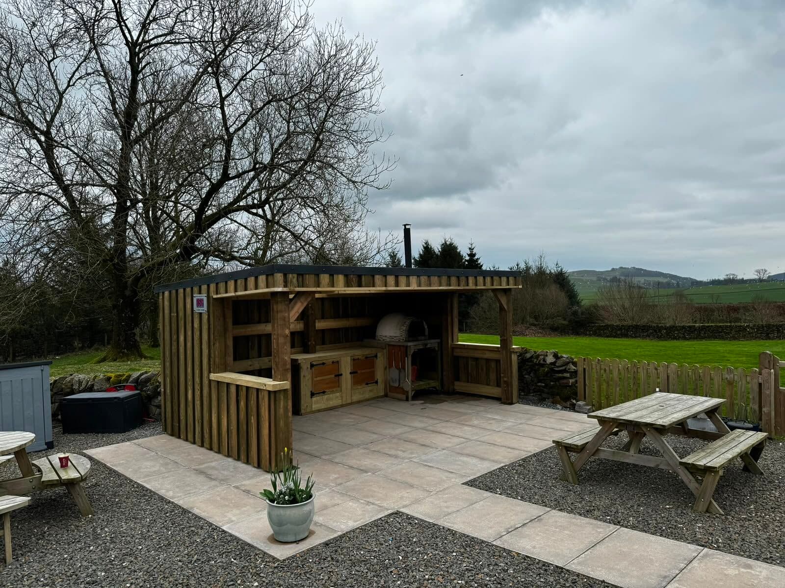 Timber-framed garden BBQ shelter